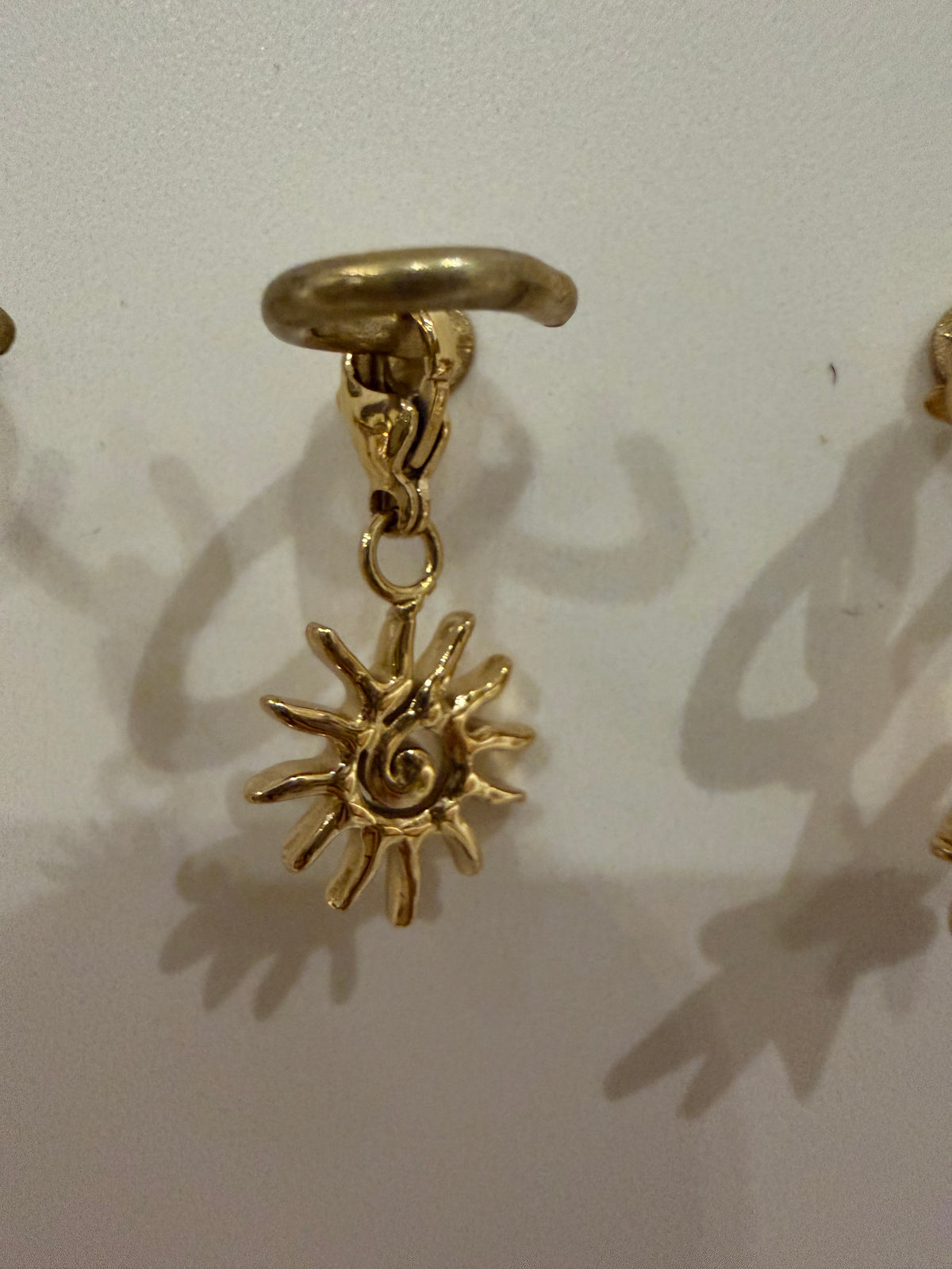 Charms soleil spirale